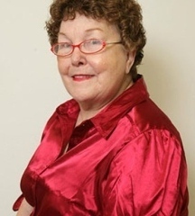 Photo of woman with 50 year old silicone implants