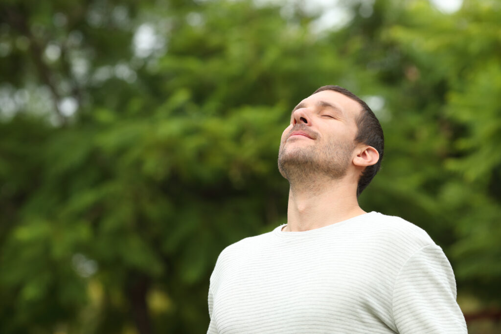 man happy eyes closed