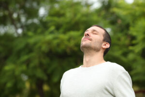 man happy eyes closed